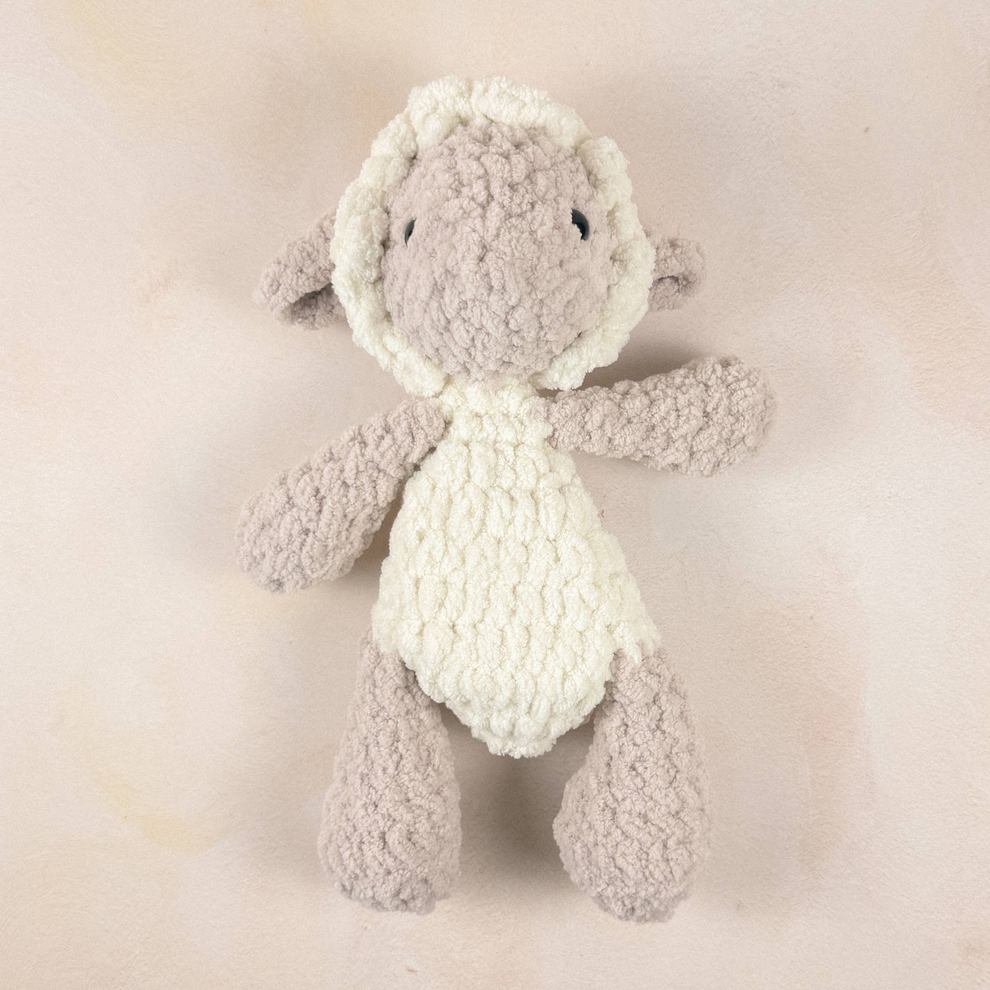 Lamb lovey shown flat on a light background to display shape and proportions.